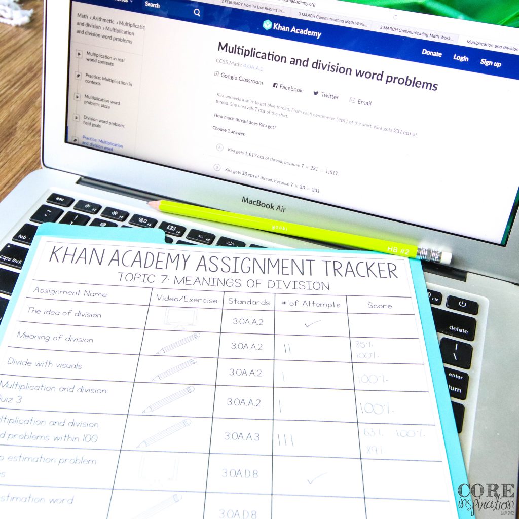 Khan Academy paper tracking sheet laying on top of student Chromebook keyboard.
