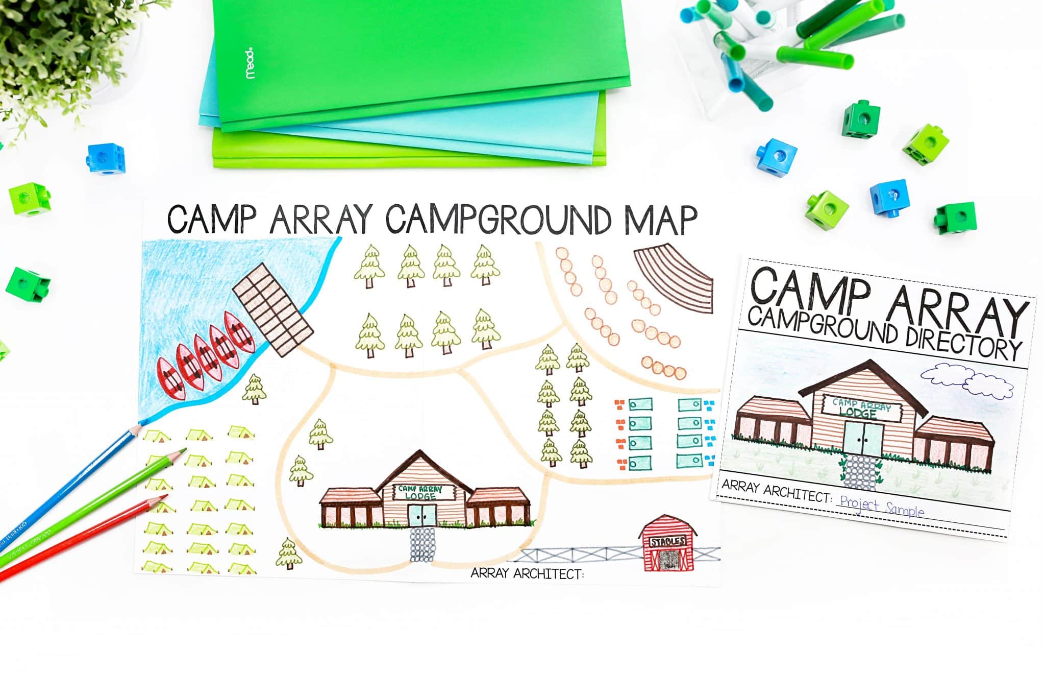 Multiplication math project sample showing a camping-themed map of arrays laying next to a booklet that shows all the mathematical thinking connected to the map.
