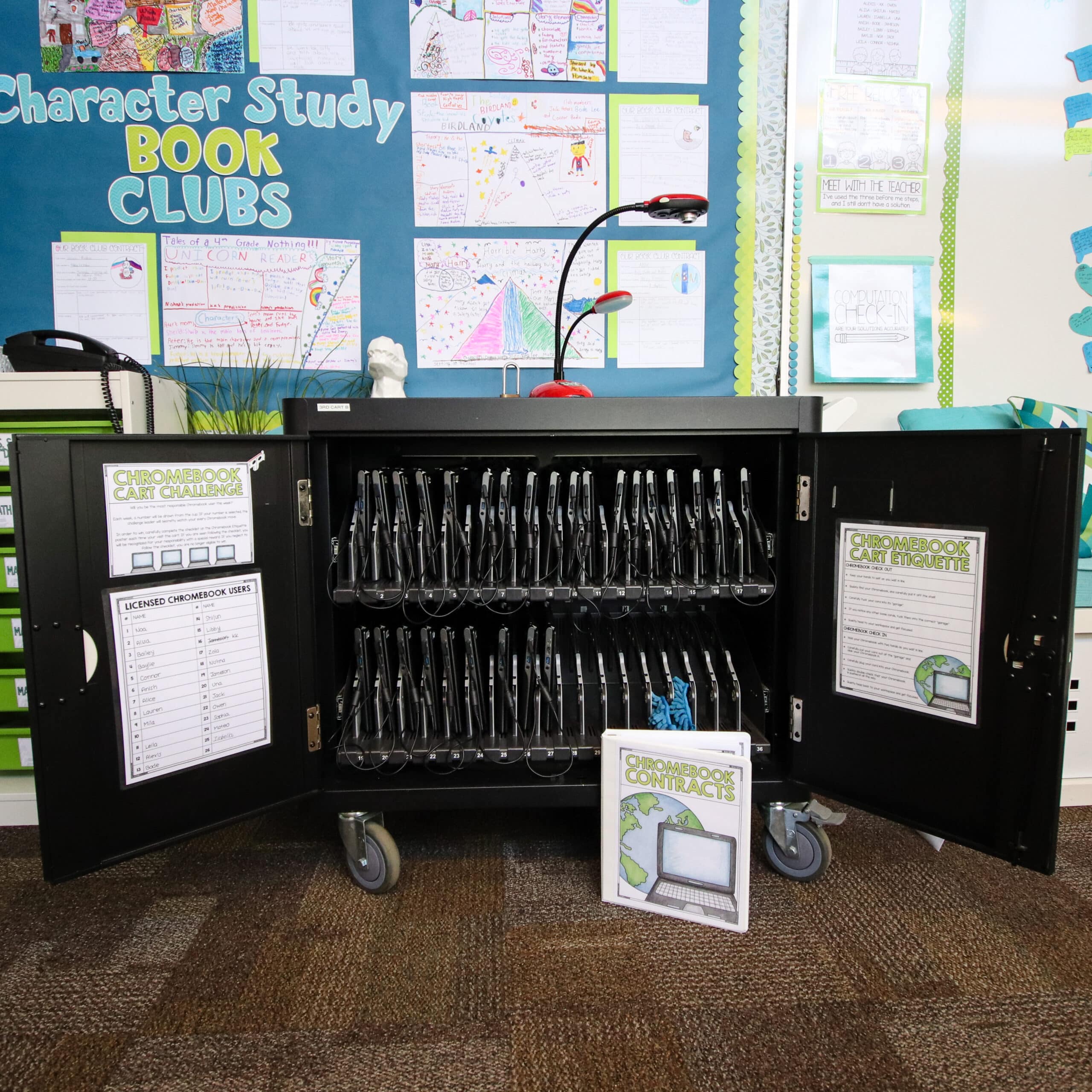 Core Inspriation's elementary classroom Chromebook Cart with posters reading "Chromebook Cart Challenge" and "Chromebook Cart Etiquette" attached to each door of the cart. 